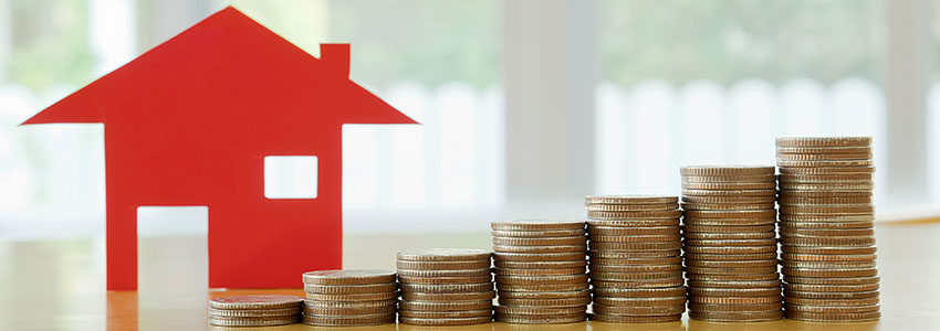 mortgage concept by money house from the coins mortgage concept by money house from the coins
